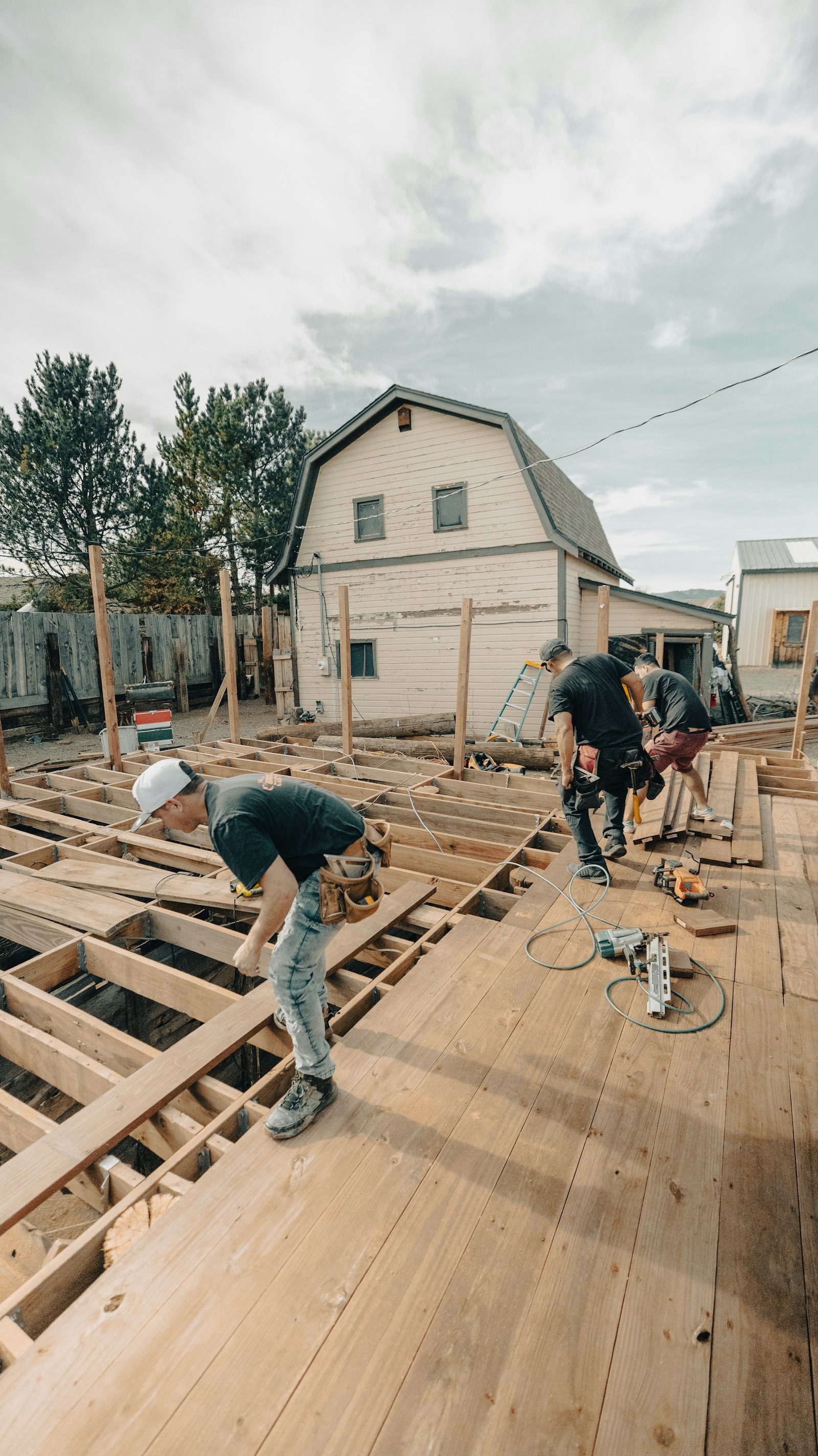 Crew framing a new wood deck.